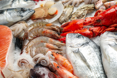 Fresh fish and seafood on ice, closeup