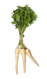 Photo of Tasty fresh ripe parsnips on white background, top view