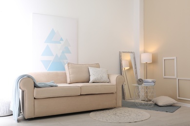 Photo of Modern living room interior with comfortable sofa