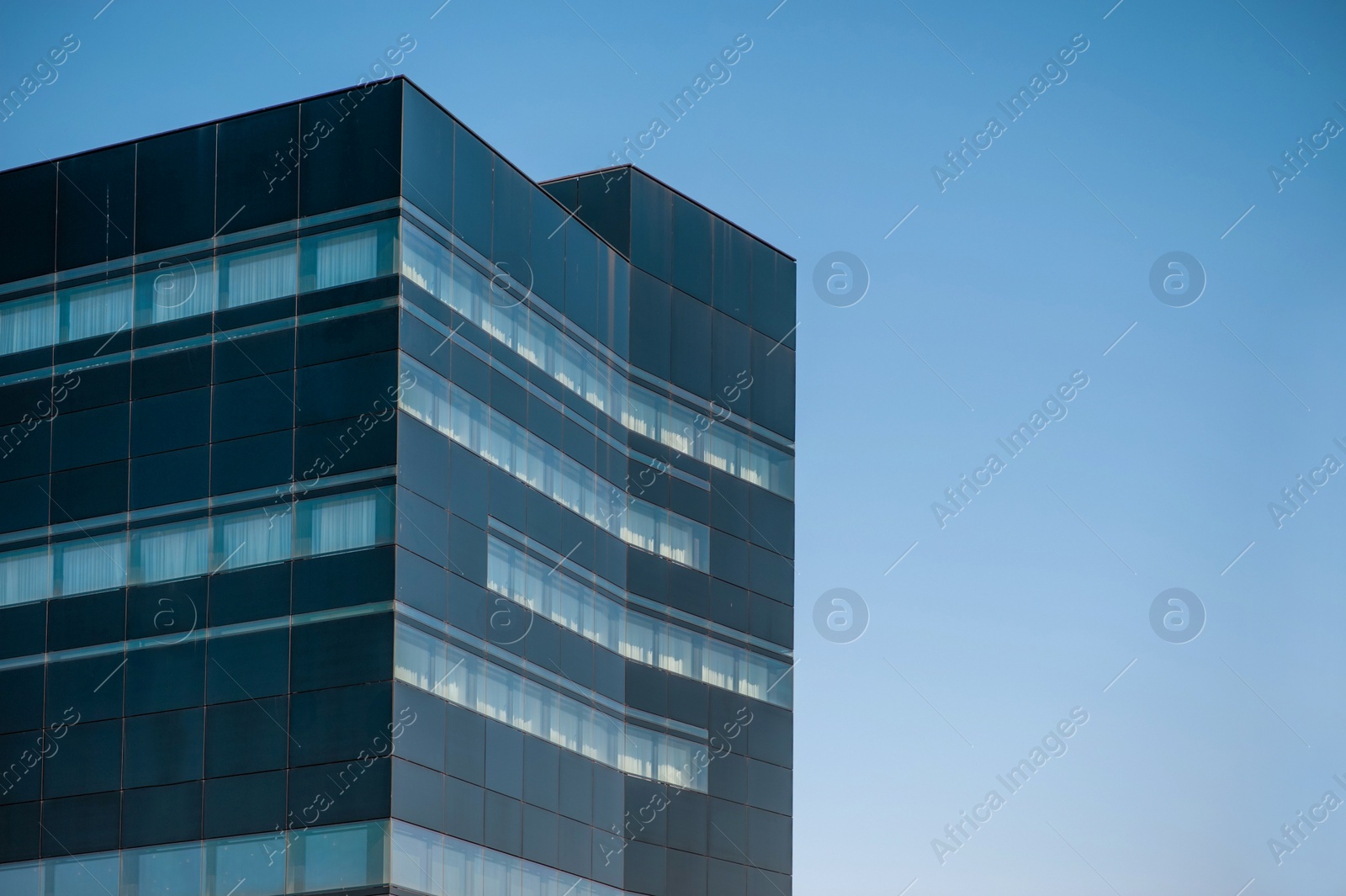 Photo of Beautiful view of modern building on sunny day