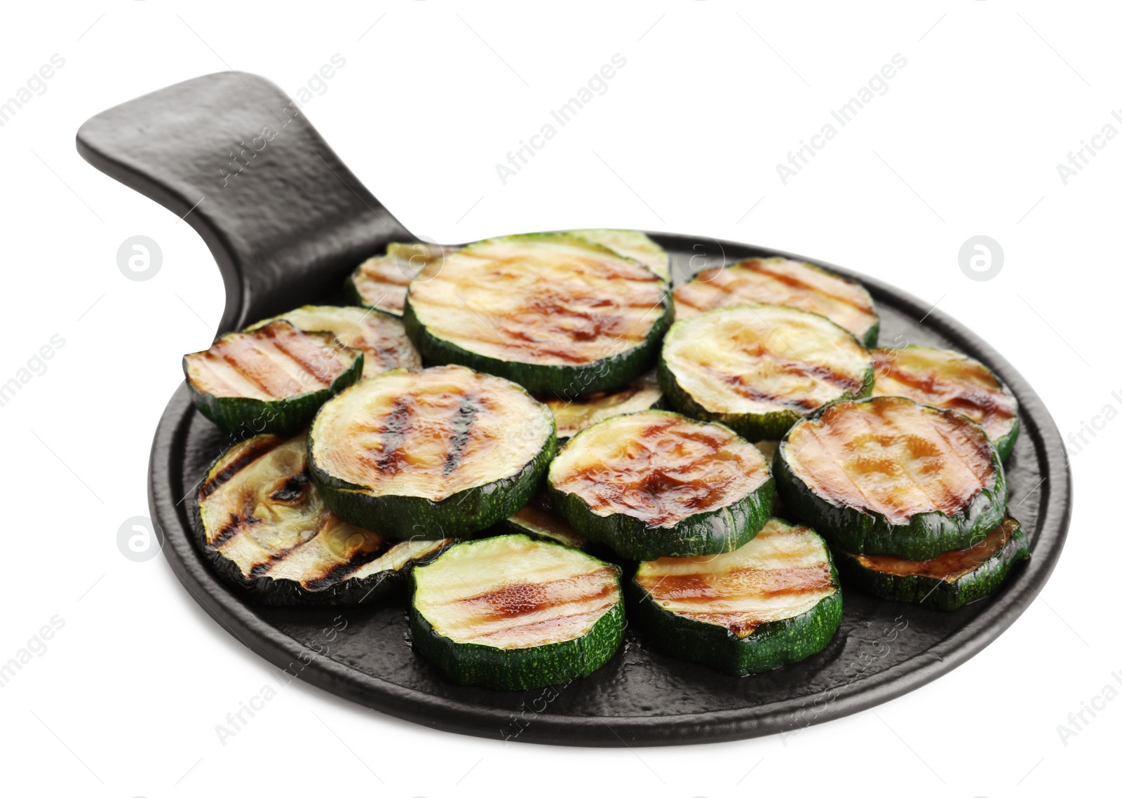 Photo of Slate plate of delicious grilled zucchini slices on white background