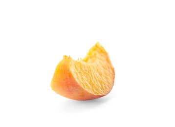 Slice of fresh sweet peach on white background