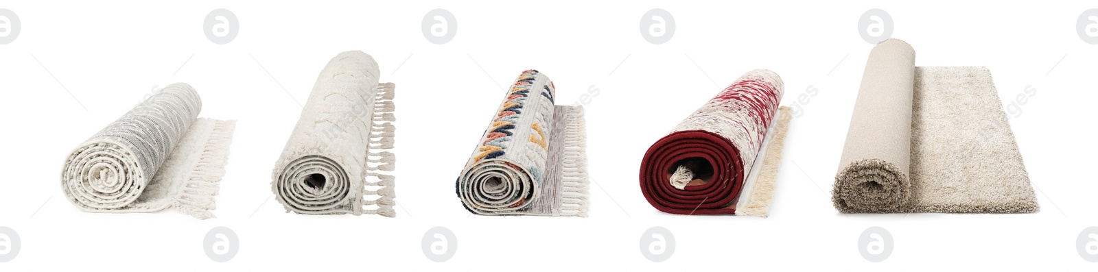 Image of Many different rolled carpets isolated on white, set