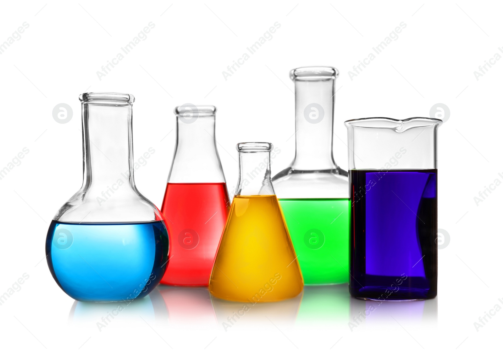 Photo of Laboratory glassware with different samples on white background. Solution chemistry