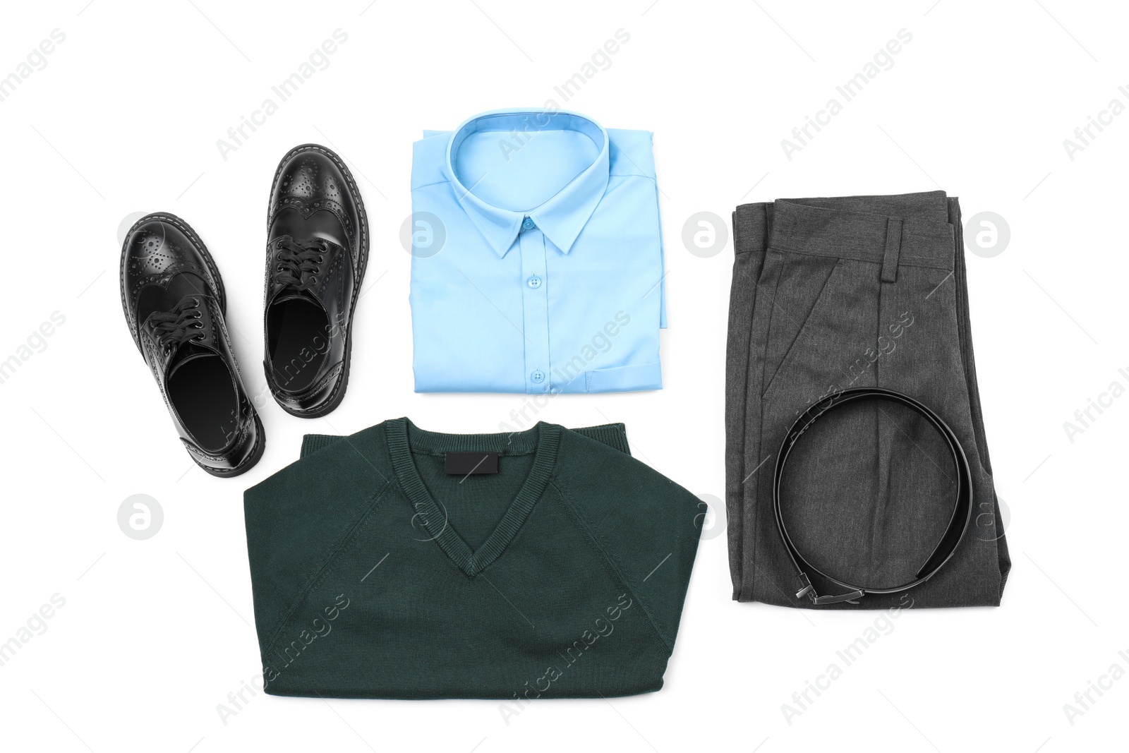 Photo of Stylish school uniform on white background, top view