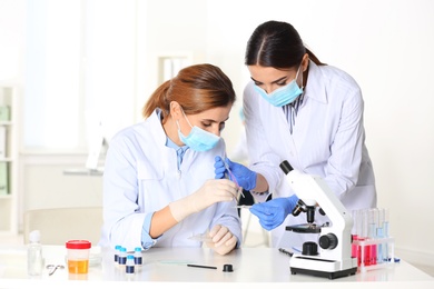 Scientists working in laboratory. Research and analysis