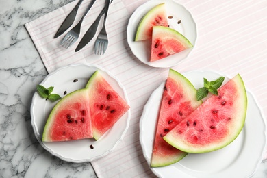 Photo of Flat lay composition with watermelon slices on marble background