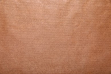 Photo of Kraft wrapping paper as background, top view