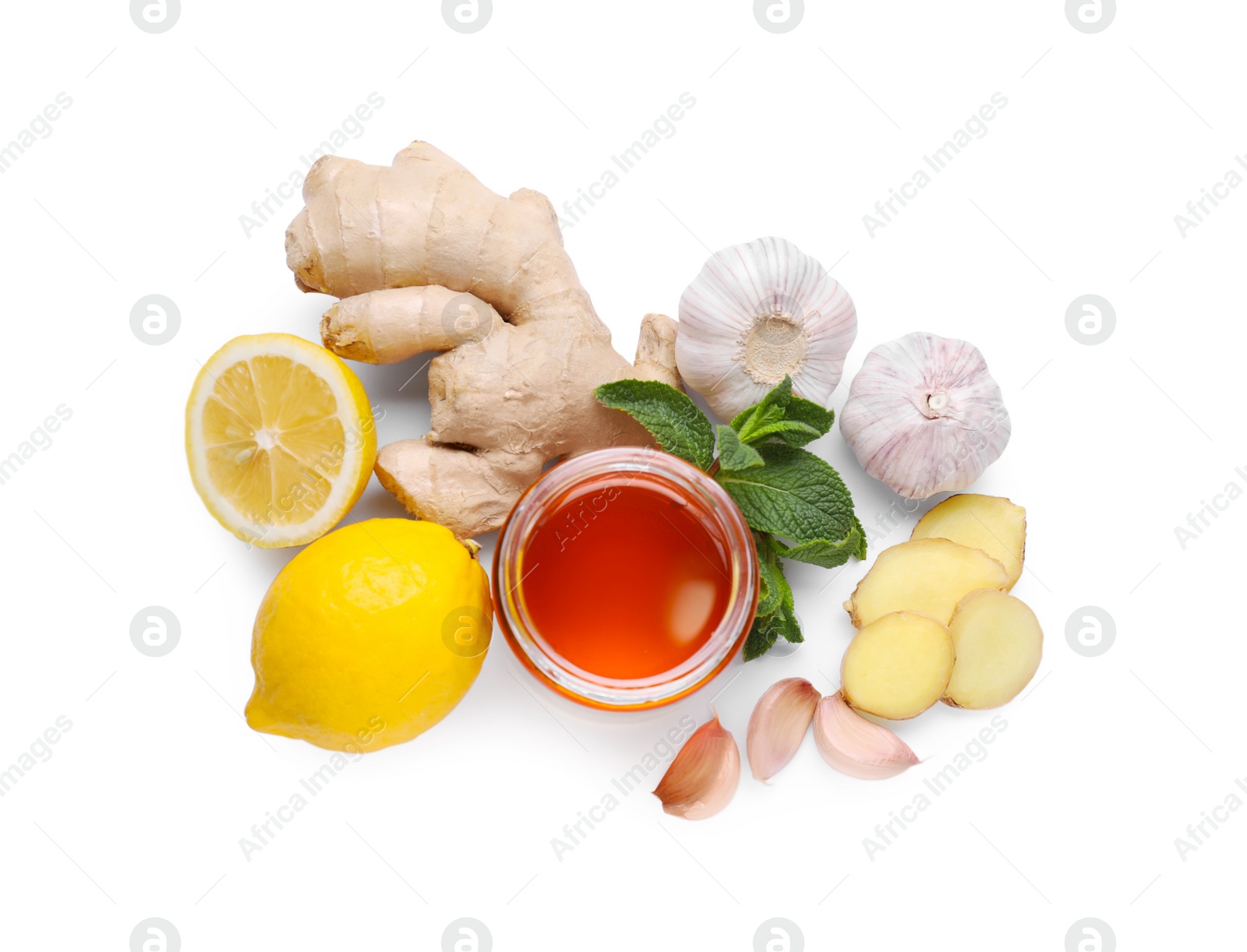 Photo of Honey, garlic, lemon, ginger and fresh mint for cough treatment. Cold remedies on white background, top view