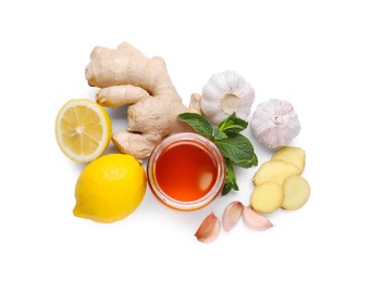 Honey, garlic, lemon, ginger and fresh mint for cough treatment. Cold remedies on white background, top view