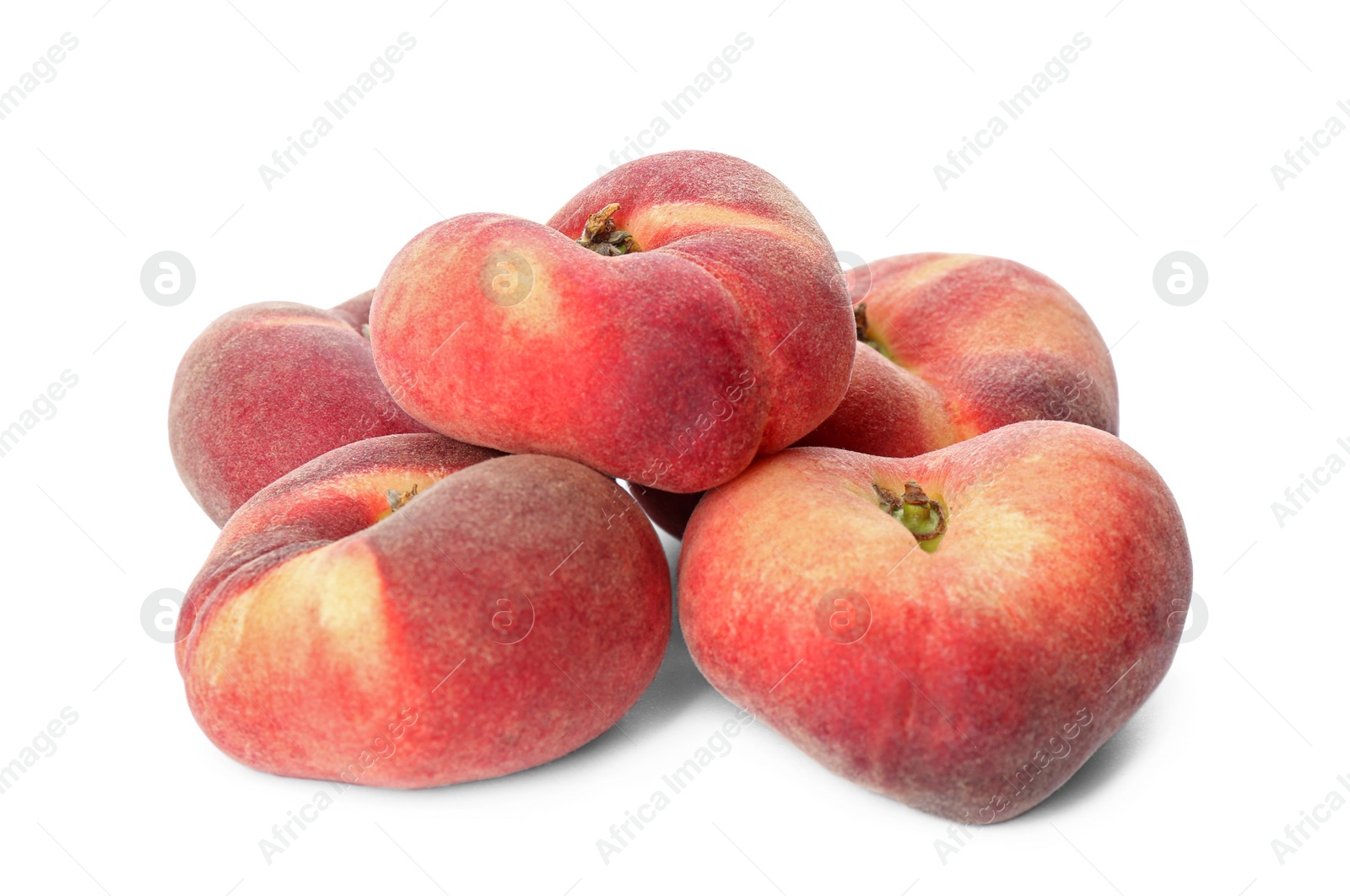 Photo of Fresh ripe donut peaches on white background