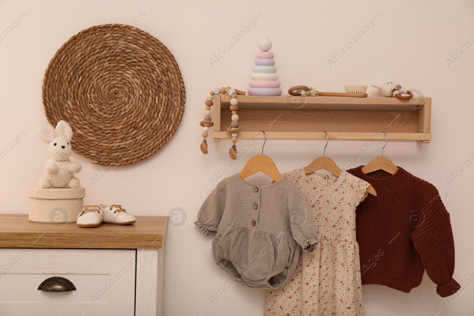 Photo of Nursery interior with stylish furniture, clothes and accessories