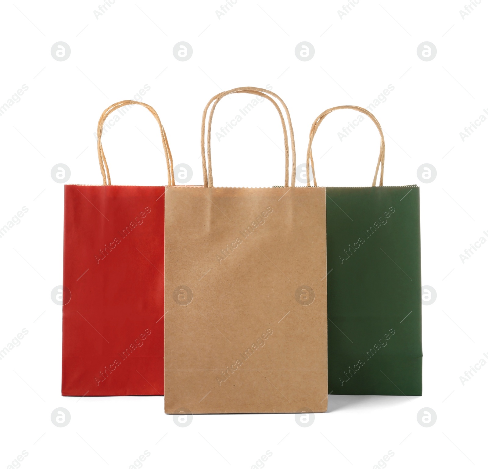 Photo of Mockup of paper shopping bags on white background