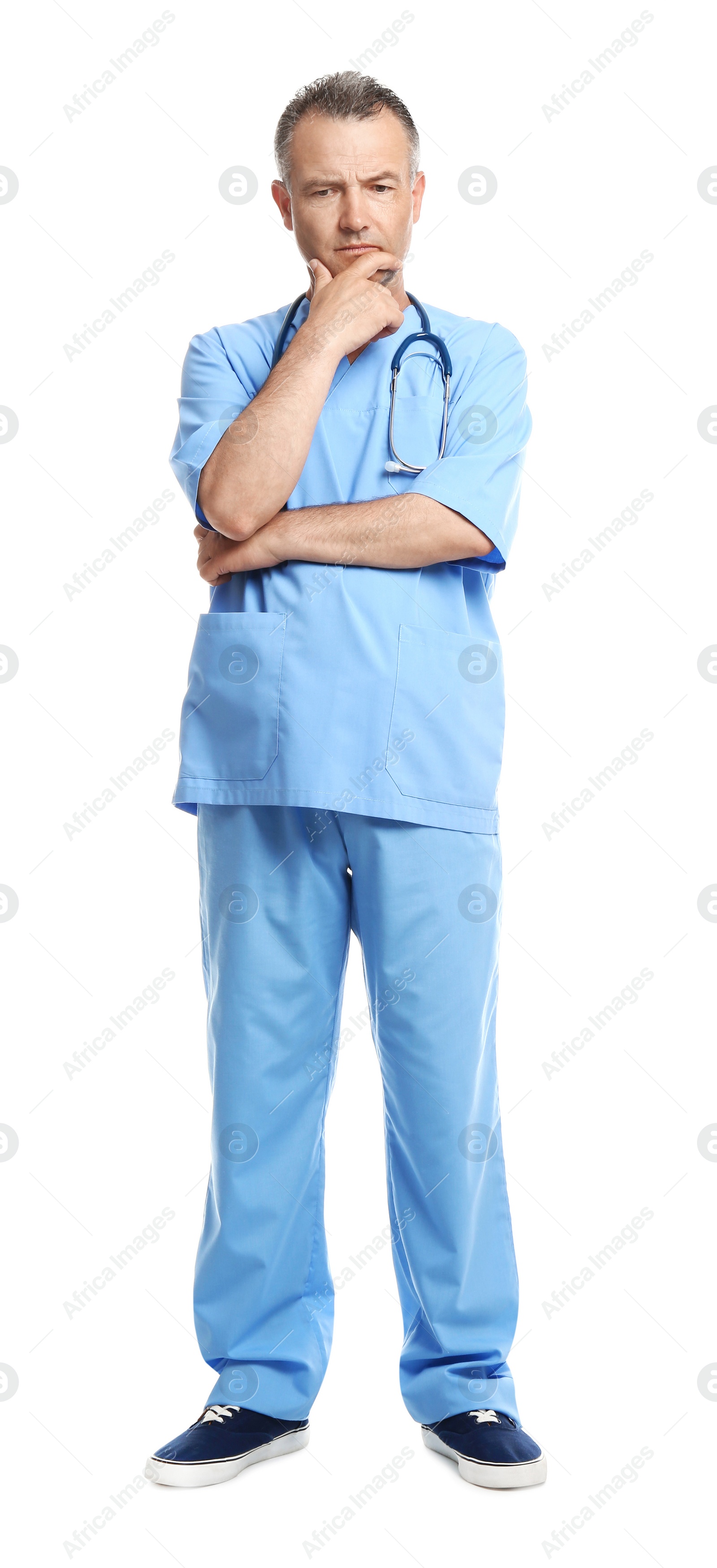 Photo of Full length portrait of experienced doctor in uniform on white background. Medical service