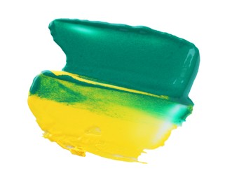 Photo of Green and yellow paint samples on white background, top view