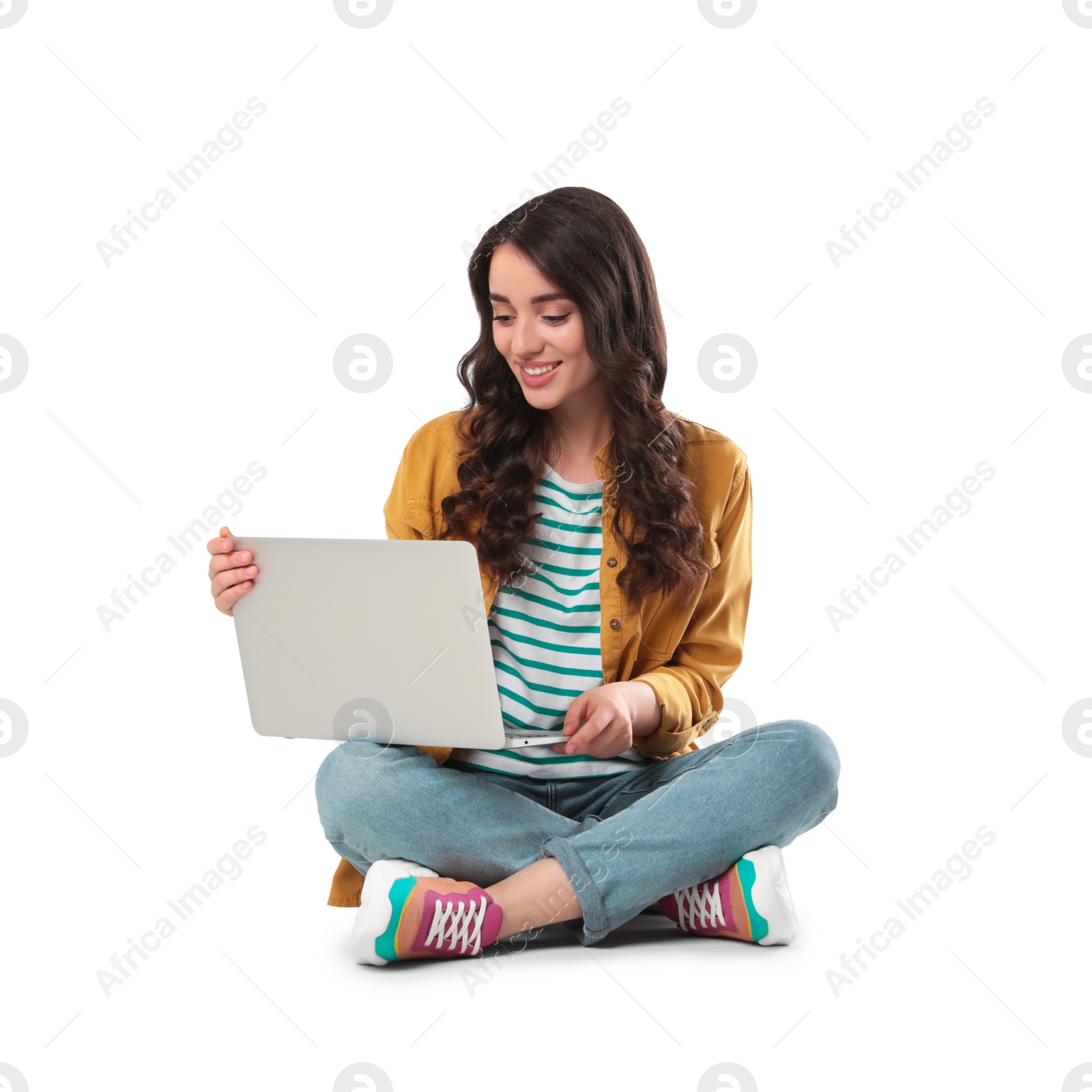 Photo of Young woman sitting with laptop on white background