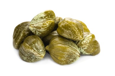 Photo of Pile of delicious pickled capers on white background