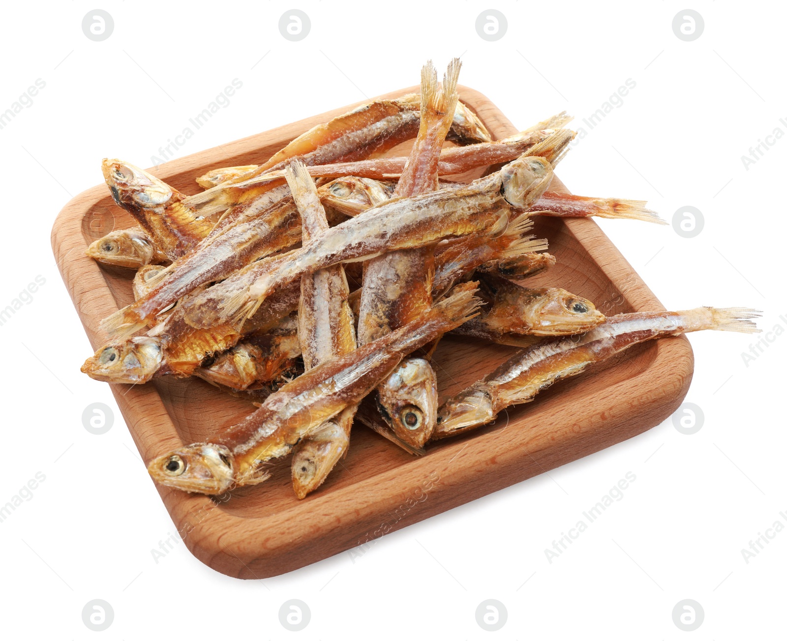 Photo of Delicious dried salted anchovies on white background