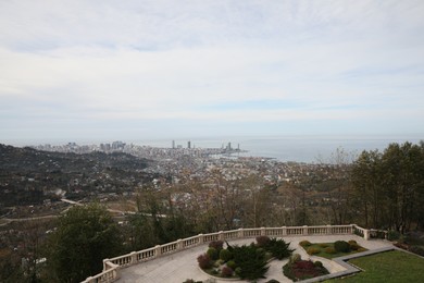 Picturesque view of city and sea under blue sky