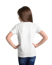 Photo of Little girl in t-shirt on white background. Mockup for design