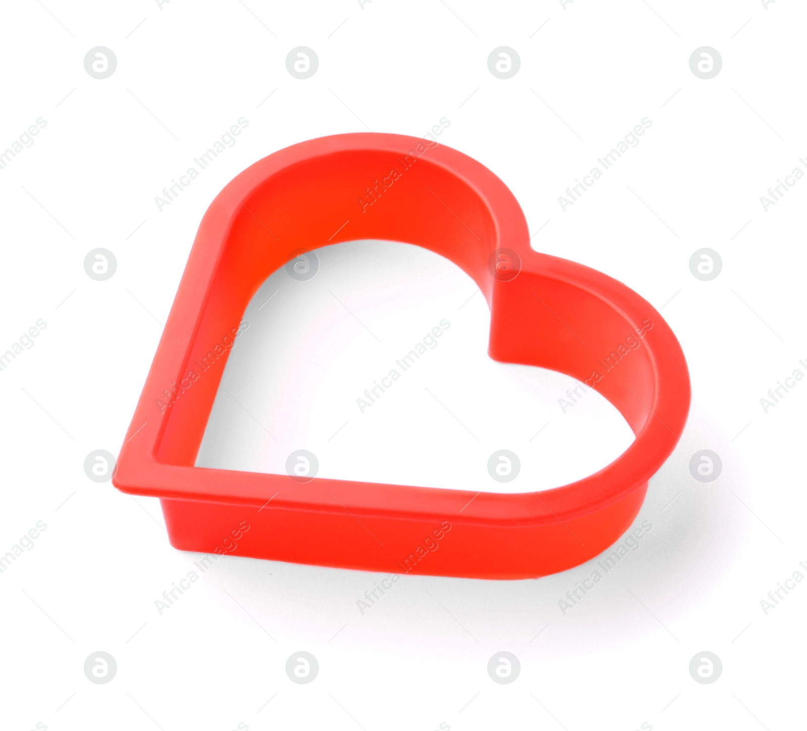 Photo of Heart shaped cookie cutter on white background