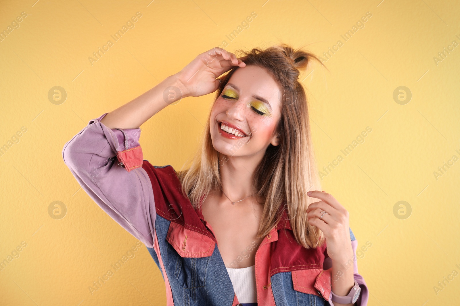 Photo of Beautiful young woman posing on color background. Summer fashion