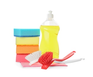 Photo of Cleaning supplies for dish washing on white background