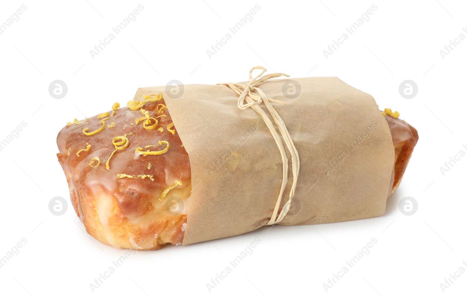 Photo of Wrapped tasty lemon cake with glaze isolated on white