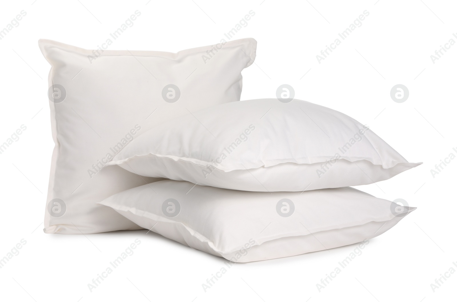 Photo of Many new soft pillows isolated on white