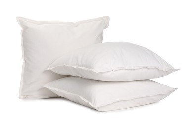 Photo of Many new soft pillows isolated on white