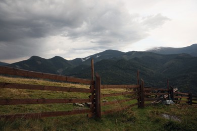 Beautiful view of mountain countryside with wooden fence