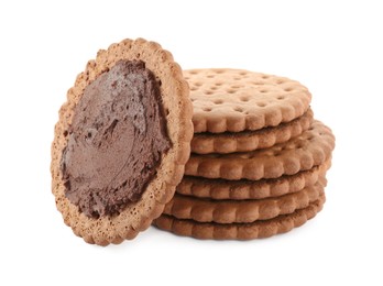 Photo of Tasty chocolate sandwich cookies with cream on white background