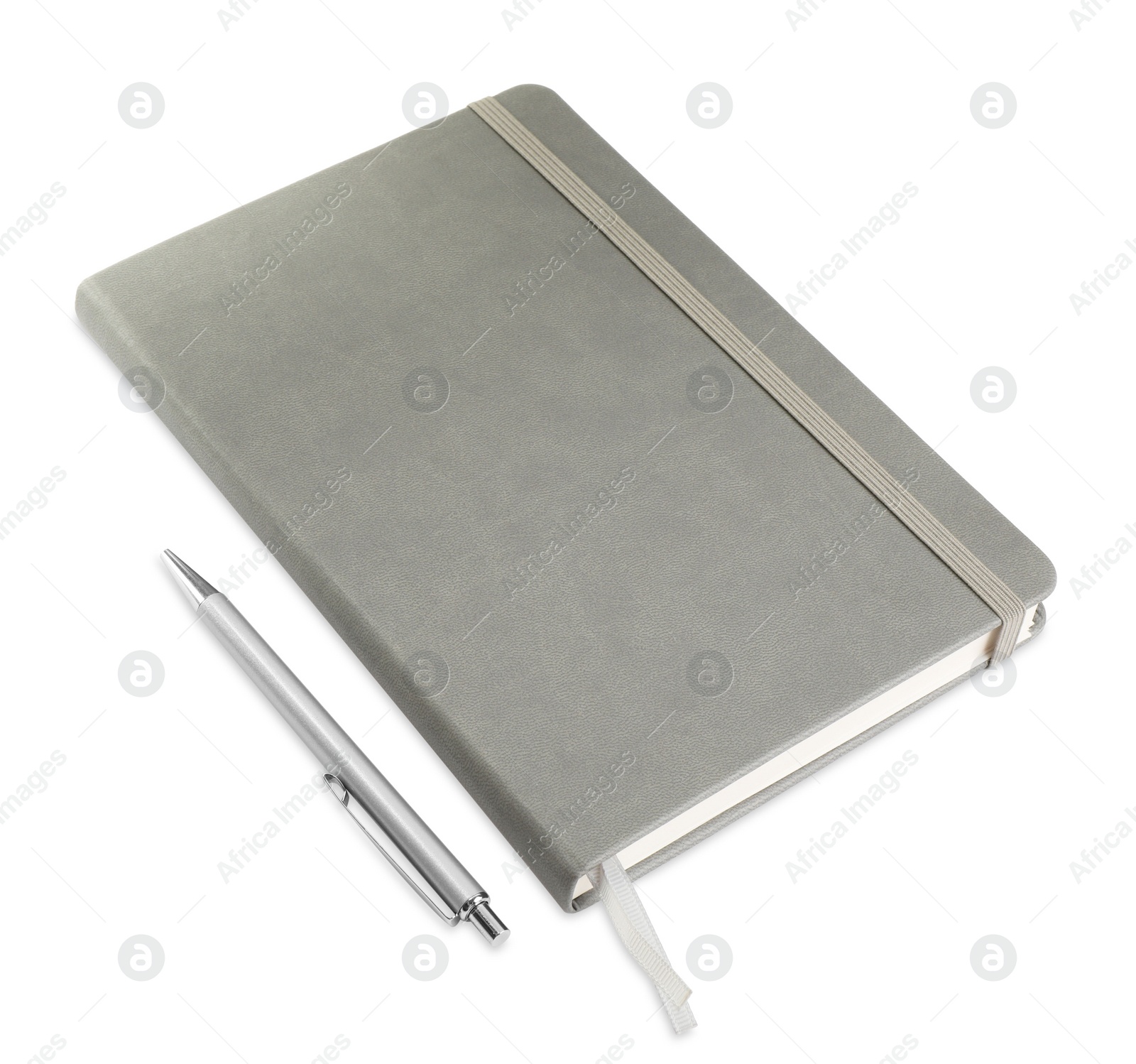 Photo of Closed grey notebook with pen isolated on white