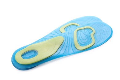 Photo of Light blue orthopedic insoles isolated on white