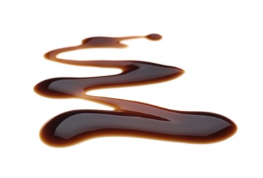 Photo of Smear of soy sauce spilled on white background