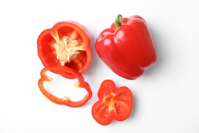 Photo of Raw ripe paprika peppers on white background, top view