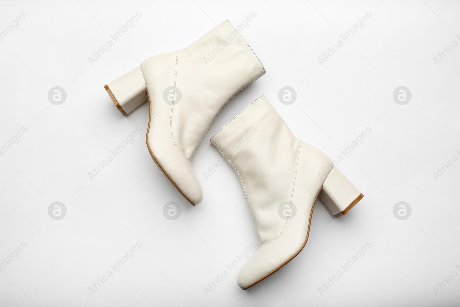 Photo of Pair of stylish leather shoes on white background, top view