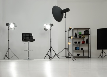 Photo of Interior of modern photo studio with professional equipment