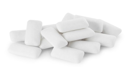 Photo of Pile of tasty chewing gums on white background