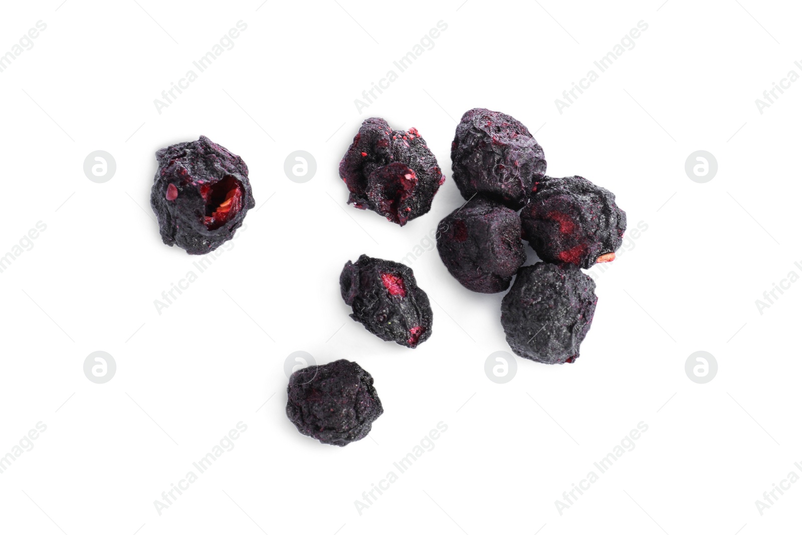 Photo of Pile of freeze dried blueberries on white background, top view