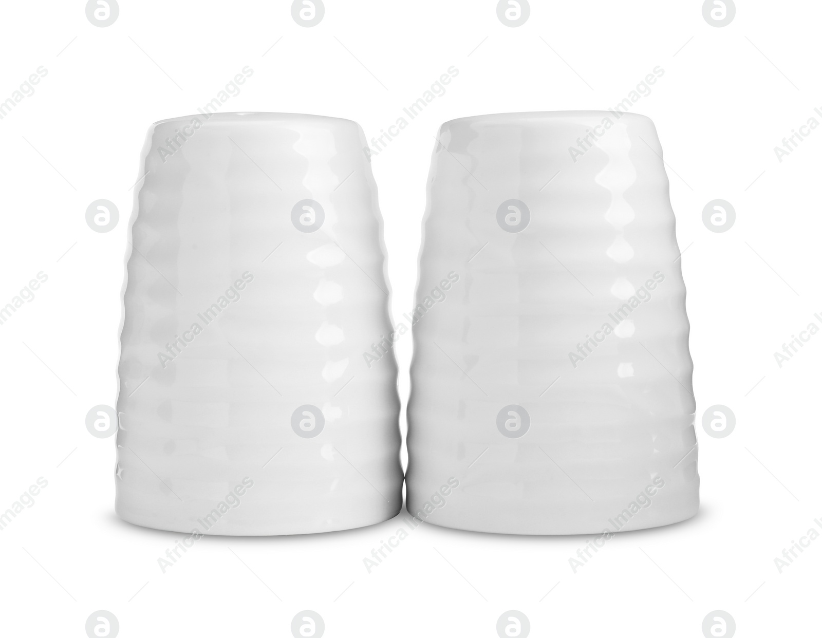 Photo of Salt and pepper shakers isolated on white