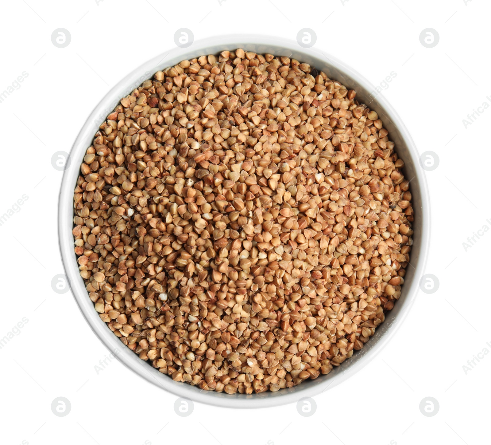 Photo of Bowl with uncooked buckwheat on white background, top view