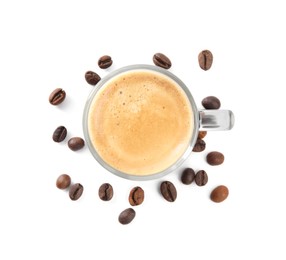 Photo of Cup of tasty coffee and beans isolated on white, top view