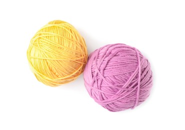 Photo of Soft colorful woolen yarns on white background, top view