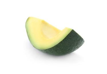 Slice of ripe avocado on white background