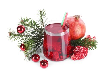 Photo of Aromatic Sangria drink in glass, pomegranates and Christmas decor isolated on white