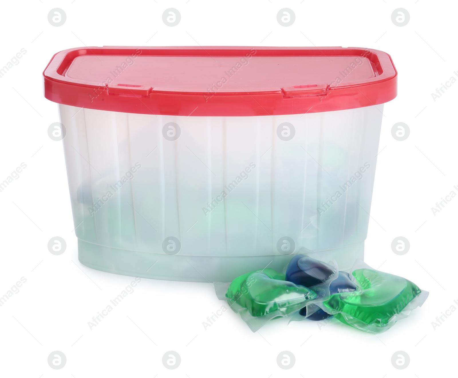 Photo of Laundry capsules and box on white background