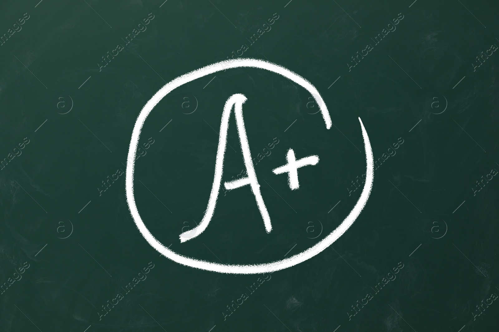 Image of School grade. Letter A with plus symbol on green chalkboard