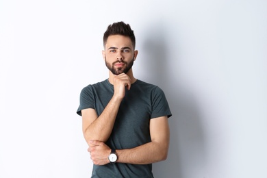 Portrait of handsome confident man isolated on white