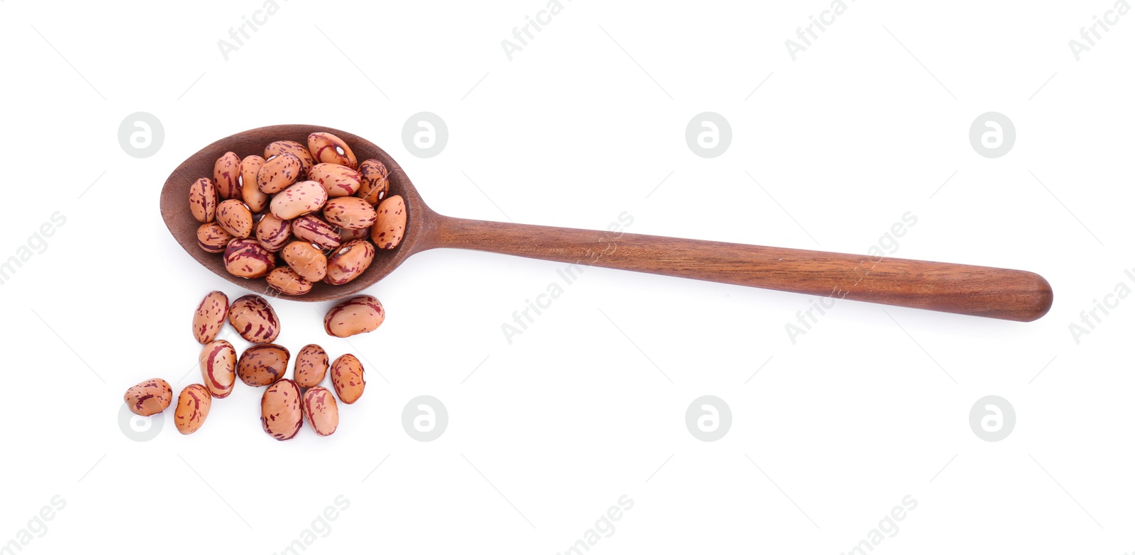 Photo of Wooden spoon and dry kidney beans isolated on white, top view